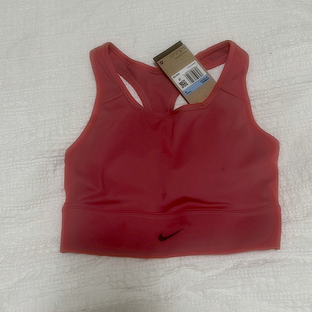 NIKE Swoosh Bra, Never Worn! It is a Dri Fit with a built in bra.